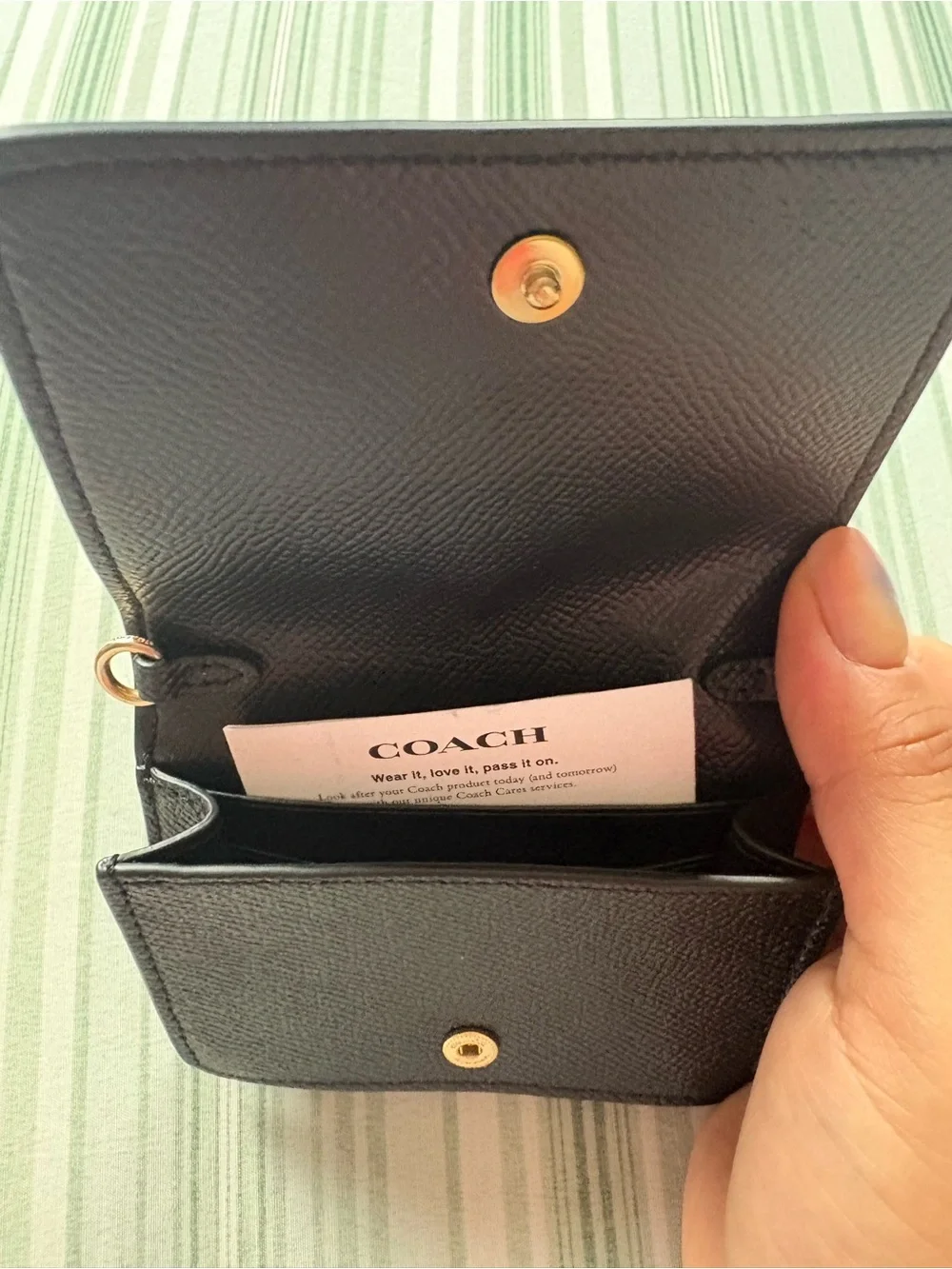 Coach Black Leather Compact Wallet with Gold Logo Accent